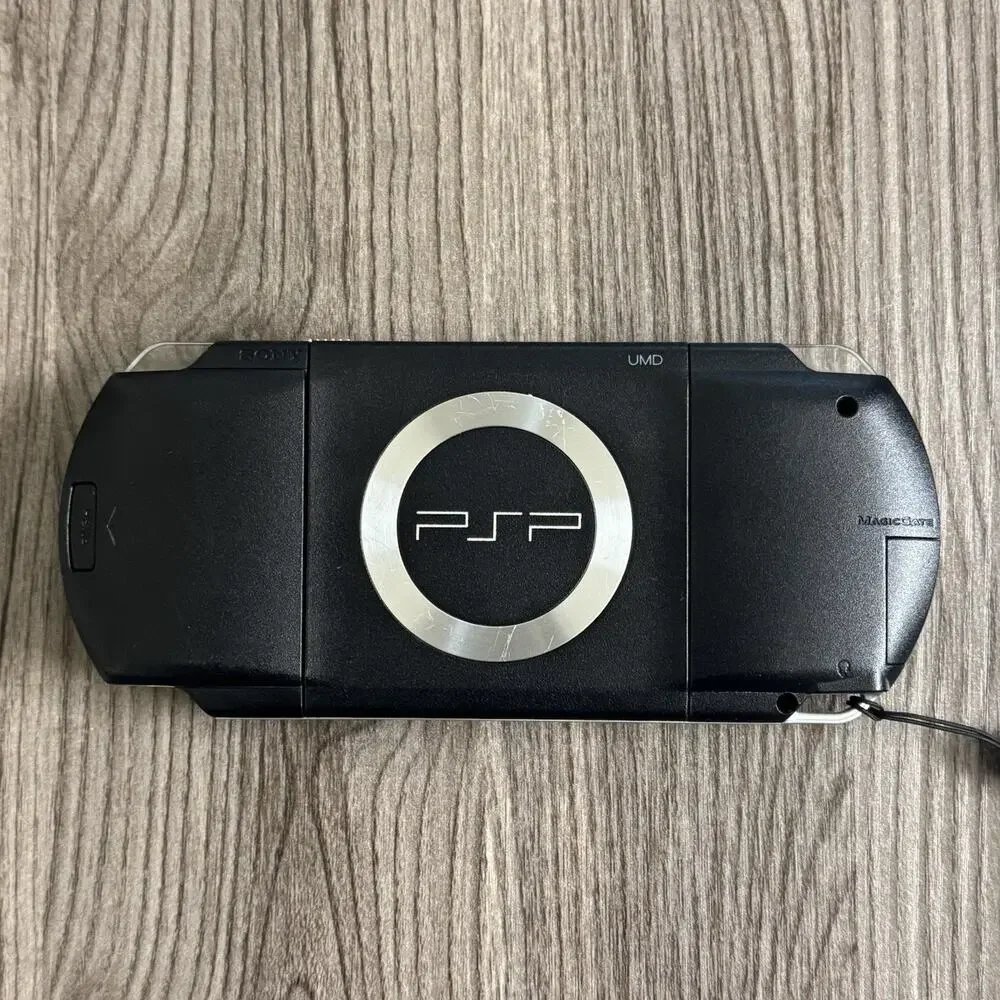 Sony PSP 1001 w/ Battery, 64GB Micro SD Card, Charger, & Carrying Sleeve